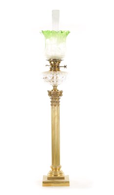 Lot 666 - A 19TH CENTURY BRASS CORINTHIAN COLUMN OIL LAMP