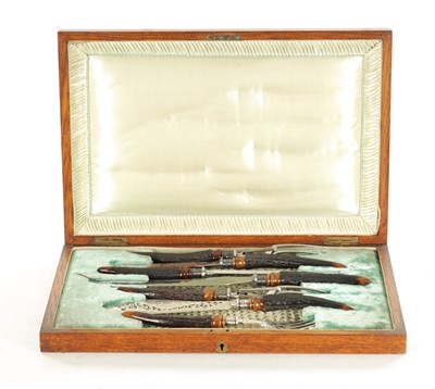 Lot 537 - A FINE CASED LATE VICTORIAN SILVER MOUNTED CARVING AND FISH SERVING SET