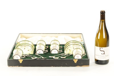 Lot 254 - A CASED ROYAL WORCESTER SIX PIECE COFFEE SERVICE WITH SILVER PLATED CUPHOLDERS AND SPOONS