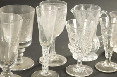 Lot 18 - A SET OF FOUR ENGRAVED AND CUT LEMONADE GLASSES