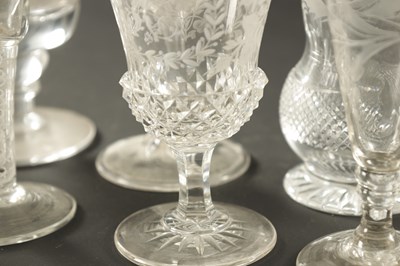 Lot 18 - A SET OF FOUR ENGRAVED AND CUT LEMONADE GLASSES