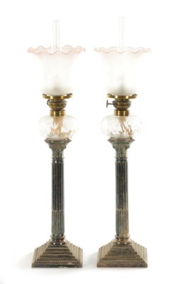 Lot 667 - A PAIR OF 19TH CENTURY SILVER PLATED CORINTHIAN COLUMN AND CUT GLASS PEG LAMPS