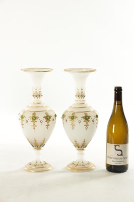 Lot 12 - A PAIR OF 19TH CENTURY FRENCH JEWELLED OPAQUE GLASS PEDESTAL VASES