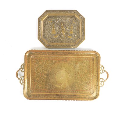 Lot 412 - A 19TH CENTURY INDIAN ENGRAVED BRASS TWO-HANDLED TRAY