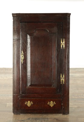 Lot 843 - AN EARLY 18TH CENTURY OAK HANGING CORNER CUPBOARD