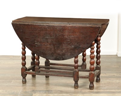 Lot 866 - AN EARLY 18TH CENTURY JOINED OAK GATE LEG TABLE