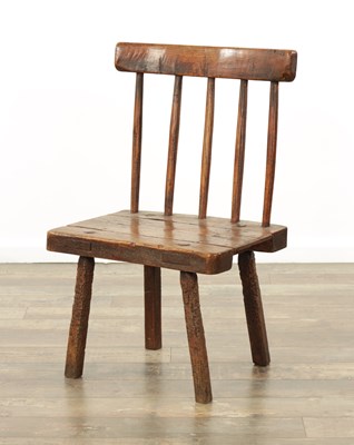 Lot 863 - A 19TH CENTURY ELM PRIMITIVE STICK BACK CHAIR