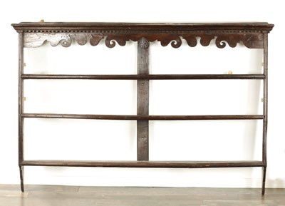 Lot 860 - A GEORGE III HANGING OAK DELFT RACK