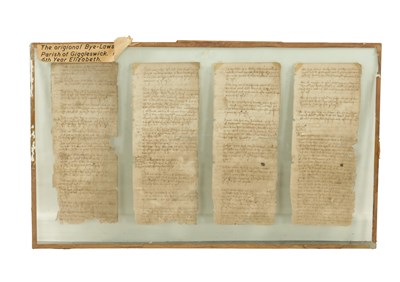 Lot 762 - AN EARLY DOUBLE SIDED FRAMED INDENTURE “THE ORIGINAL BYE-LAWS OF THE PARISH OF GIGGLESWICK” 1564, 6TH YEAR OF ELIZABETH I