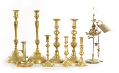 Lot 544 - THREE PAIRS OF 19TH CENTURY BRASS CANDLESTICKS