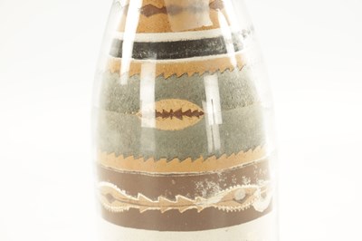 Lot 824 - A RARE LATE 19TH CENTURY AMERICAN COLOURED GUANO FILLED BOTTLE