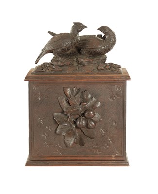 Lot 1144 - A 19TH CENTURY CARVED WALNUT BLACK FOREST HUMIDOR