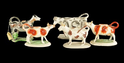 Lot 85 - A COLLECTION OF LATE 19TH CENTURY STAFFORDSHIRE POTTERY COW CREAMERS