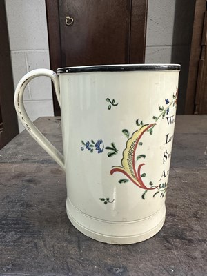 Lot 333 - A LATE 18TH CENTURY CREAMWARE MUG INSCRIBED WOMAN MAKES MEN LOVE