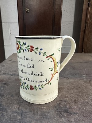 Lot 333 - A LATE 18TH CENTURY CREAMWARE MUG INSCRIBED WOMAN MAKES MEN LOVE