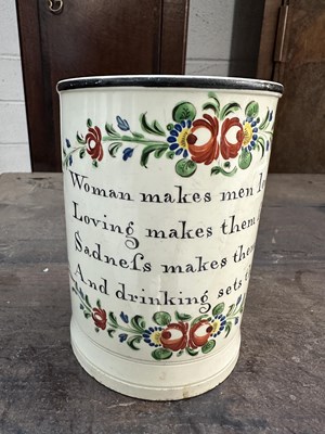 Lot 333 - A LATE 18TH CENTURY CREAMWARE MUG INSCRIBED WOMAN MAKES MEN LOVE