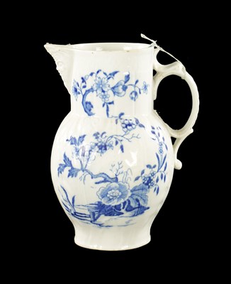 Lot 145 - A LATE 18TH CENTURY CAUGHLEY PORCELAIN JUG PAINTED WITH FLOWERING PLANTS