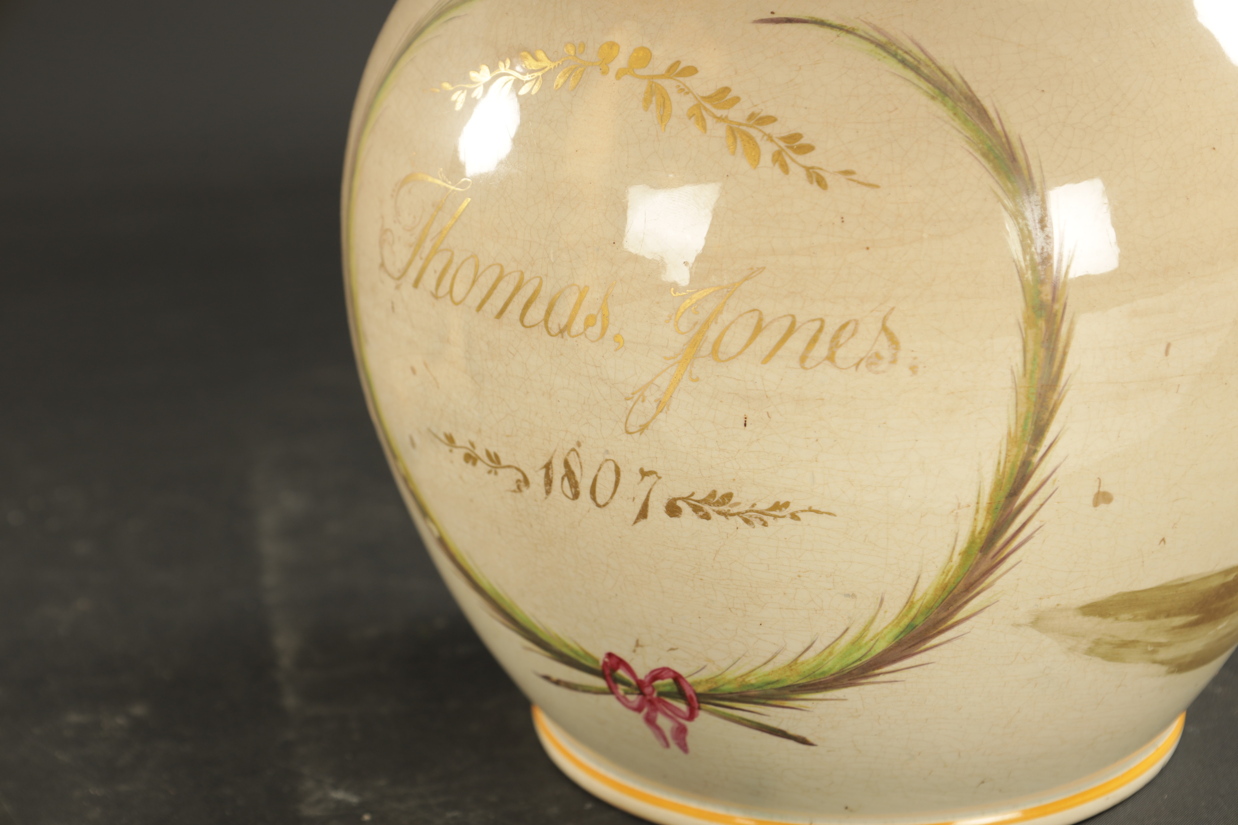 Lot 256 A RARE PEARLWARE JUG PAINTED WITH A MUSICIAN