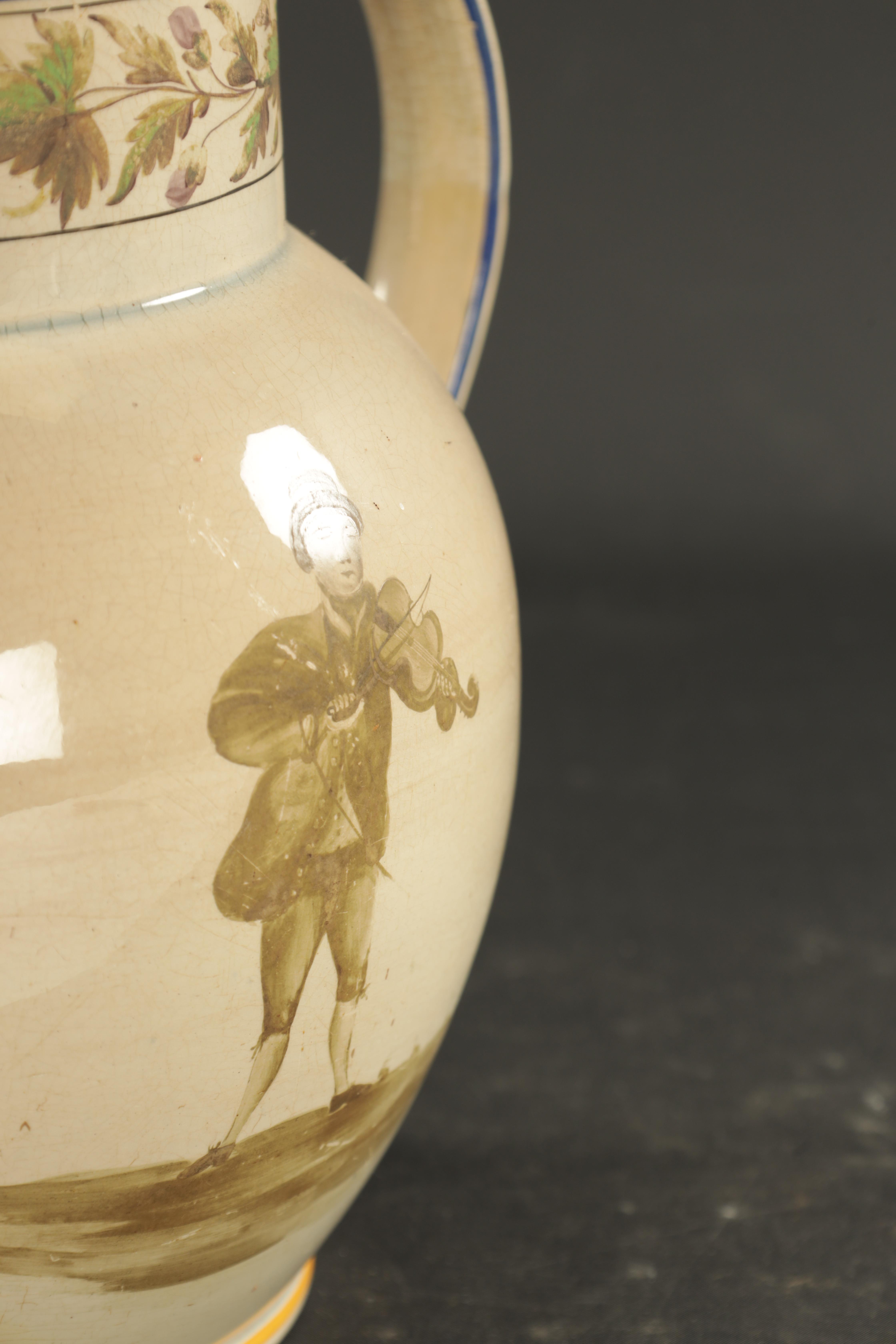 Lot 256 A RARE PEARLWARE JUG PAINTED WITH A MUSICIAN