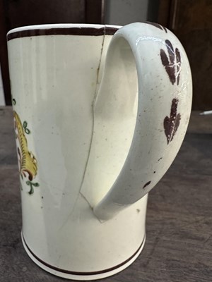 Lot 356 - TWO LATE 18TH CENTURY YORKSHIRE CREAMWARE FROG MUGS