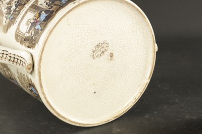 Lot 369 - A LARGE NORTH EAST POTTERIES LOVING CUP PRINTED AND PAINTED WITH DICKENSIAN CHARACTERS