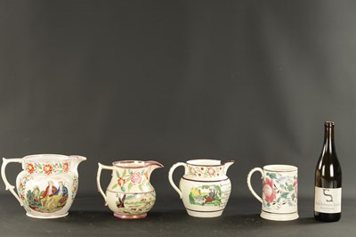 Lot 215 - THREE EARLY 19TH CENTURY ENGLISH POTTERY JUGS AND A MUG