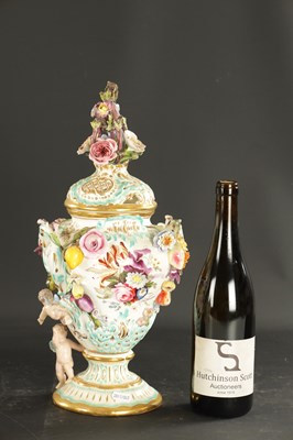 Lot 212 - AN EARLY 19TH CENTURY MINTON PORCELAIN VASE IN THE MEISSEN STYLE PAINTED WITH FLOWERS