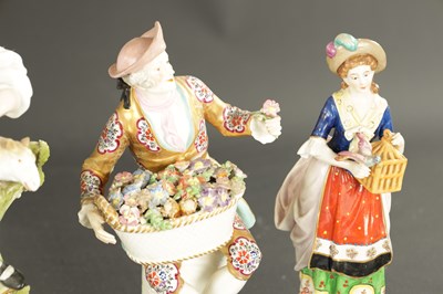 Lot 242 - A PAIR OF DRESDEN CANDLESTICKS OF A SHEPHERD AND SHEPHERDESS