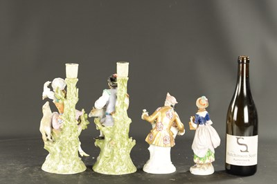 Lot 242 - A PAIR OF DRESDEN CANDLESTICKS OF A SHEPHERD AND SHEPHERDESS