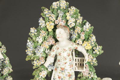 Lot 164 - THREE MID 18TH CENTURY DERBY/CHELSEA PORCELAIN FIGURE GROUPS