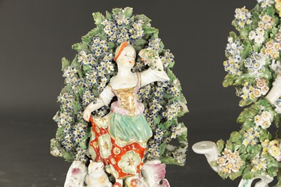 Lot 164 - THREE MID 18TH CENTURY DERBY/CHELSEA PORCELAIN FIGURE GROUPS