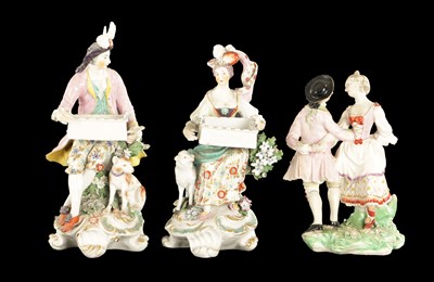 Lot A LATE 18TH CENTURY PAIR OF CHELSEA DERBY PORCELAIN FIGURES CARRYING BASKETS