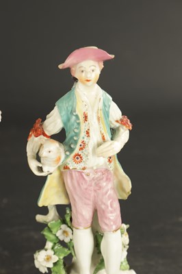 Lot 407 - A LATE 18TH CENTURY DERBY PORCELAIN FIGURE OF A FARMER WITH A LAMB TOGETHER WITH A SIMILAR FIGURE WITH A YOUNG MAN