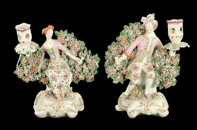 Lot A PAIR OF MID 18TH CENTURY DERBY PORCELAIN BOCAGE CANDLESTICK FIGURES