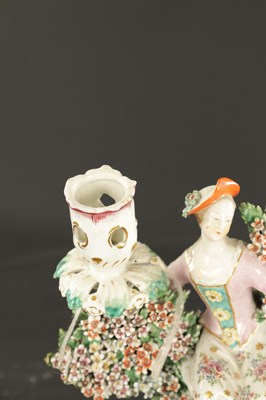 Lot A PAIR OF MID 18TH CENTURY DERBY PORCELAIN BOCAGE CANDLESTICK FIGURES