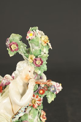 Lot 330 - TWO MID 18TH CENTURY DERBY FIGURES OF CHERUBS TOGETHER WITH A SINGLE FIGURE CHAMBERSTICK OF A CHERUB