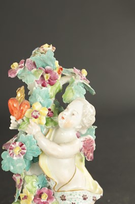 Lot 330 - TWO MID 18TH CENTURY DERBY FIGURES OF CHERUBS TOGETHER WITH A SINGLE FIGURE CHAMBERSTICK OF A CHERUB
