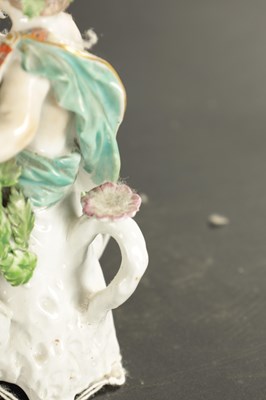 Lot 330 - TWO MID 18TH CENTURY DERBY FIGURES OF CHERUBS TOGETHER WITH A SINGLE FIGURE CHAMBERSTICK OF A CHERUB