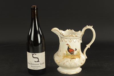 Lot 50 - A STAFFORDSHIRE PORCELAIN COCK FIGHTING JUG DATED 1852