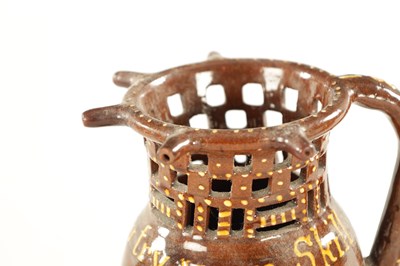 Lot 35 - A BURTON IN LONSDALE PUZZLE JUG DATED 1824