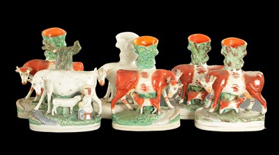 Lot 312 - TWO PAIRS OF STAFFORDSHIRE SPILL VASES WITH COWS AND CALVES