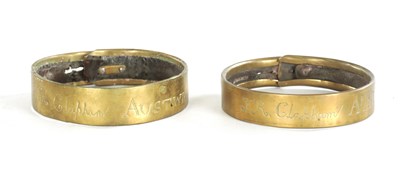 Lot 684 - TWO SIMILAR GEORGE III BRASS AND LEATHER DOG COLLARS