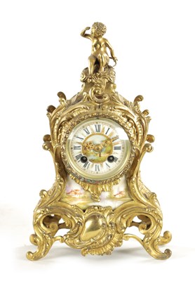 Lot 807 - A LATE 19TH CENTURY FRENCH ROCOCO PORCELAIN PANELLED BRASS MANTEL CLOCK