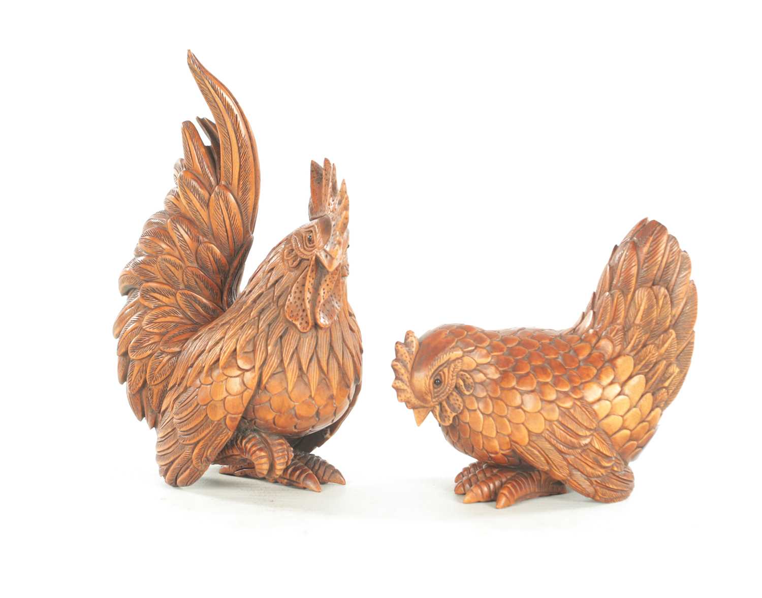 Lot 1143 - A FINE PAIR OF EARLY 20TH CENTURY CARVED BLACK FOREST SCULPTURES