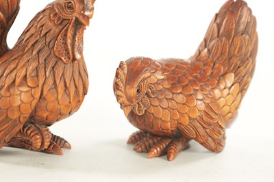 Lot 1143 - A FINE PAIR OF EARLY 20TH CENTURY CARVED BLACK FOREST SCULPTURES