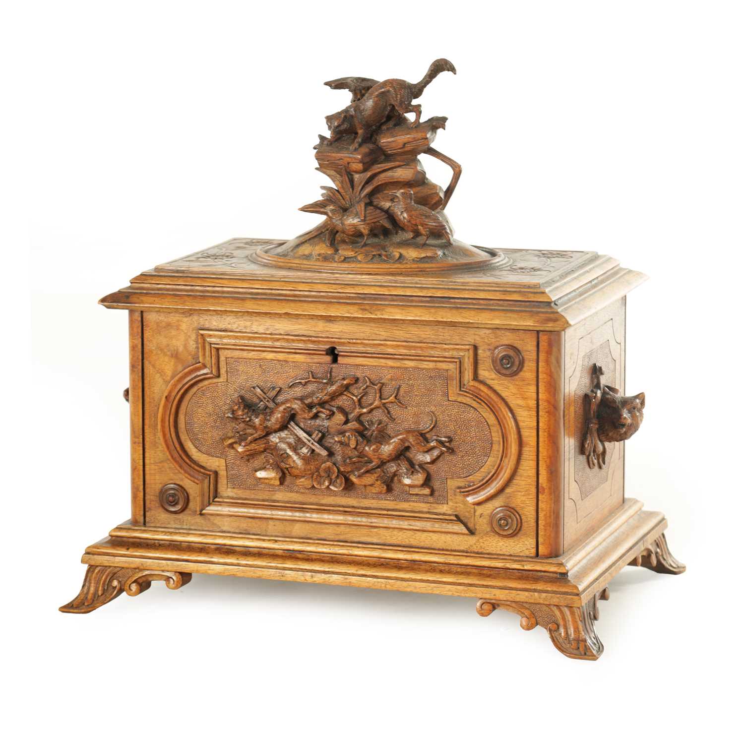 Lot 1168 - A LATE 19TH CENTURY CARVED BLACK FOREST CASKET