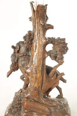 Lot 1161 - A LATE 19TH CENTURY BLACK FOREST CARVED LINDEN WOOD CENTREPIECE