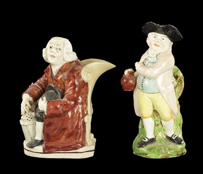 Lot 126 - TWO STAFFORDSHIRE TOBY JUBS CIRCA 1830