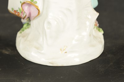 Lot 115 - A CHELSEA/DERBY PORCELAIN FIGURE OF A FRUIT SELLER CIRCA 1770