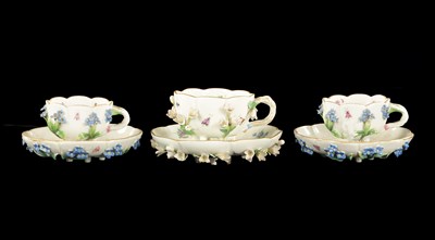 Lot 34 - THREE MID 19TH CENTURY MEISSEN PORCELAIN CUP AND SAUCERS